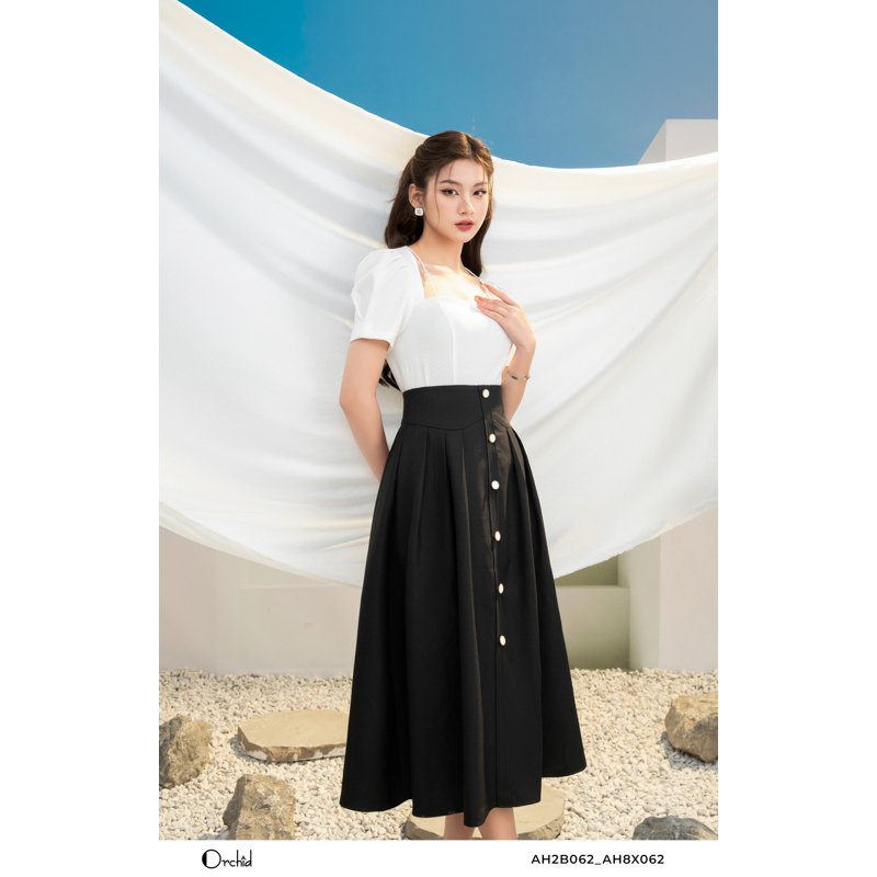 Chân váy juyp đen dáng xòe phối cúc Orchid - AH8X062
