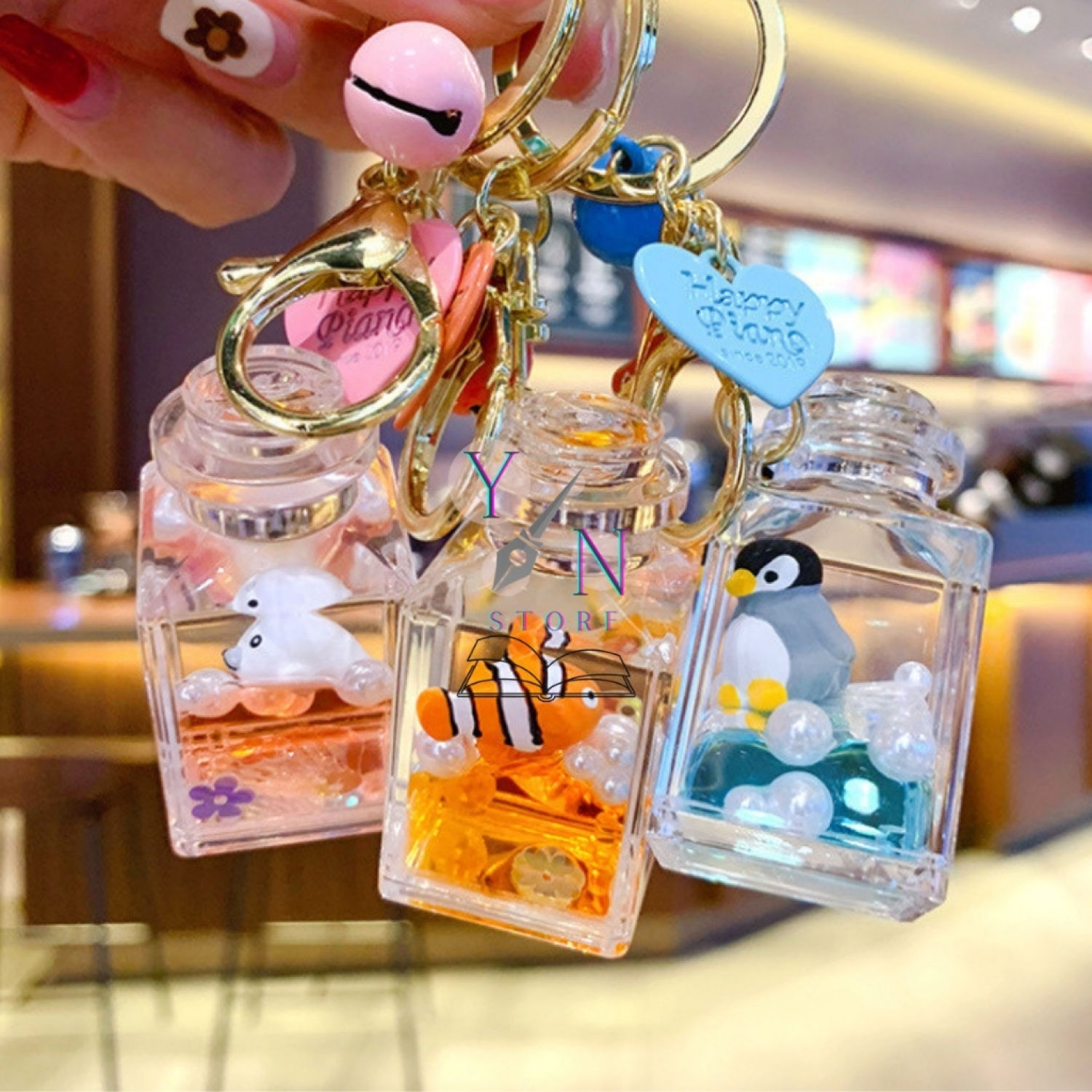 Móc Khóa Bình Nước Chứa Cả Đại Dương Dễ Thương