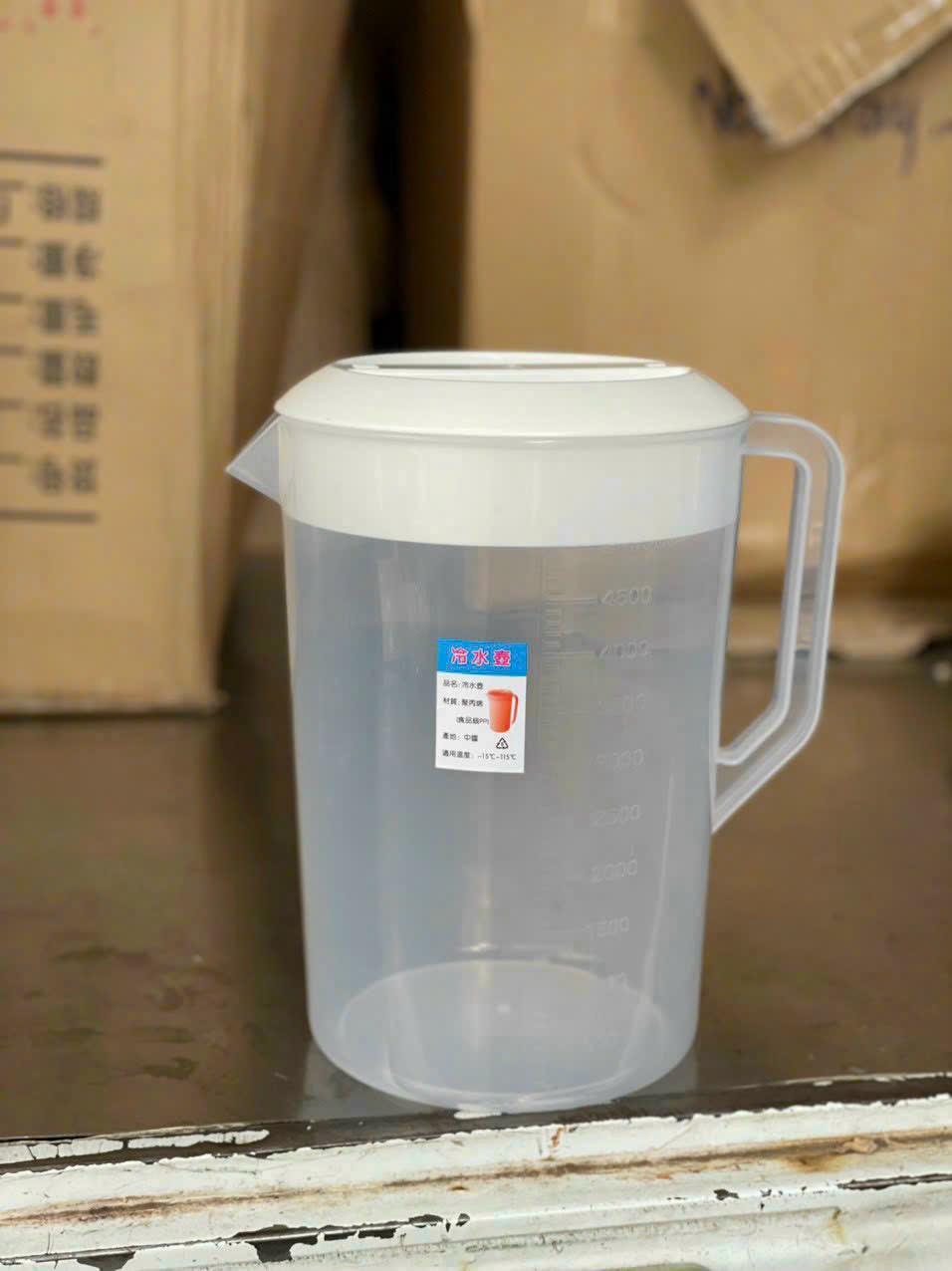 Ca đong nhựa chia vạch 5l có nắp vạch trắng