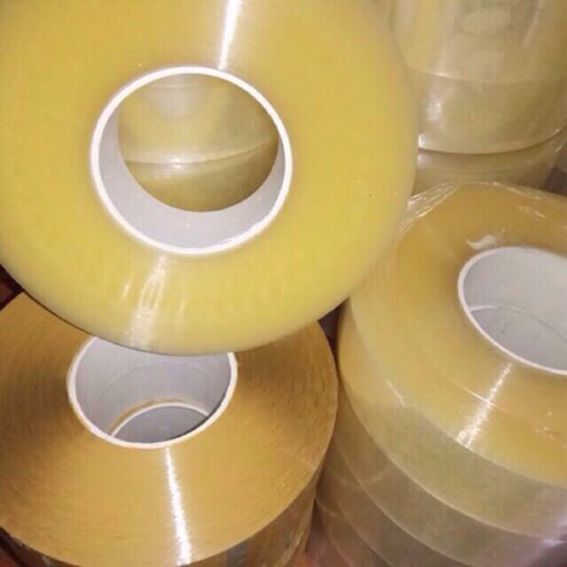 Siêu sale băng dính 1 kg lõi mỏng băng dính 1 kg lõi nhựa 2.3mm đóng hàng 3 màu trắng trong vàng đục vàng trong