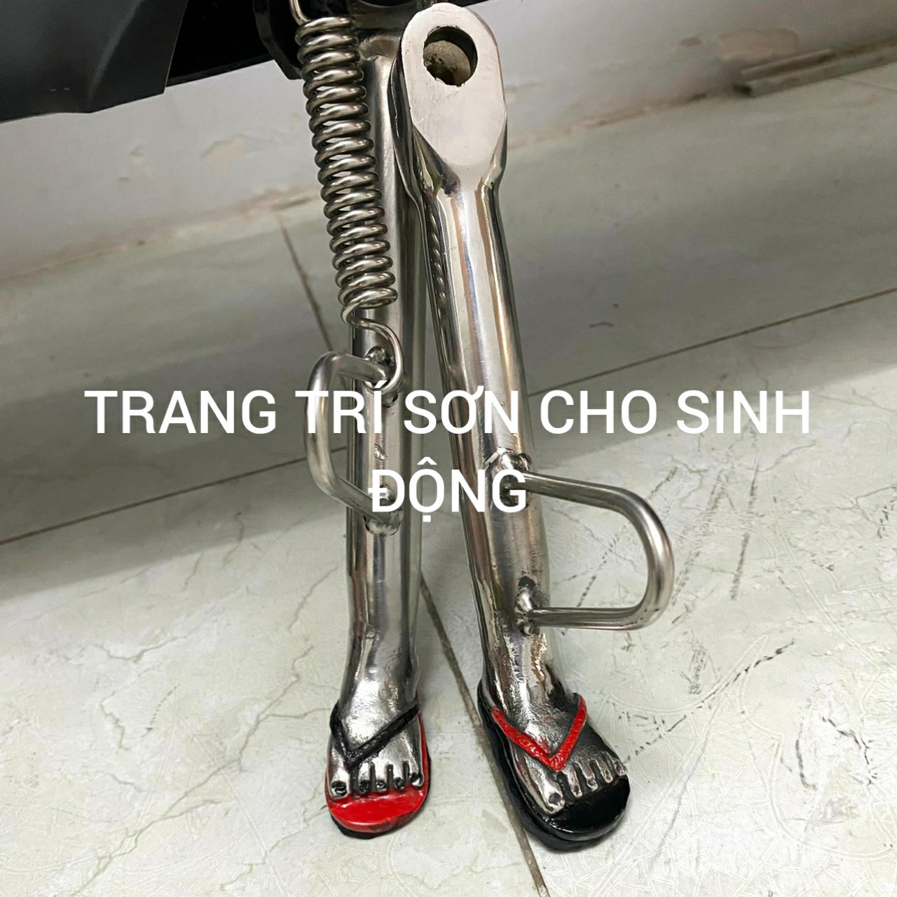 Chân chóng xe máy hình bàn chân inox đặc xe vario,vision,AB siêu cứng chống rỉ sét.Chân chóng bàn chân inox cá tính