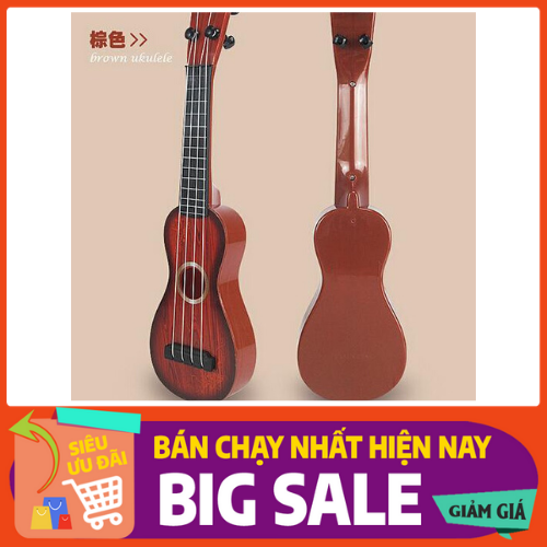Đàn gita cho bé gảy nhạc được 70cmx10cm