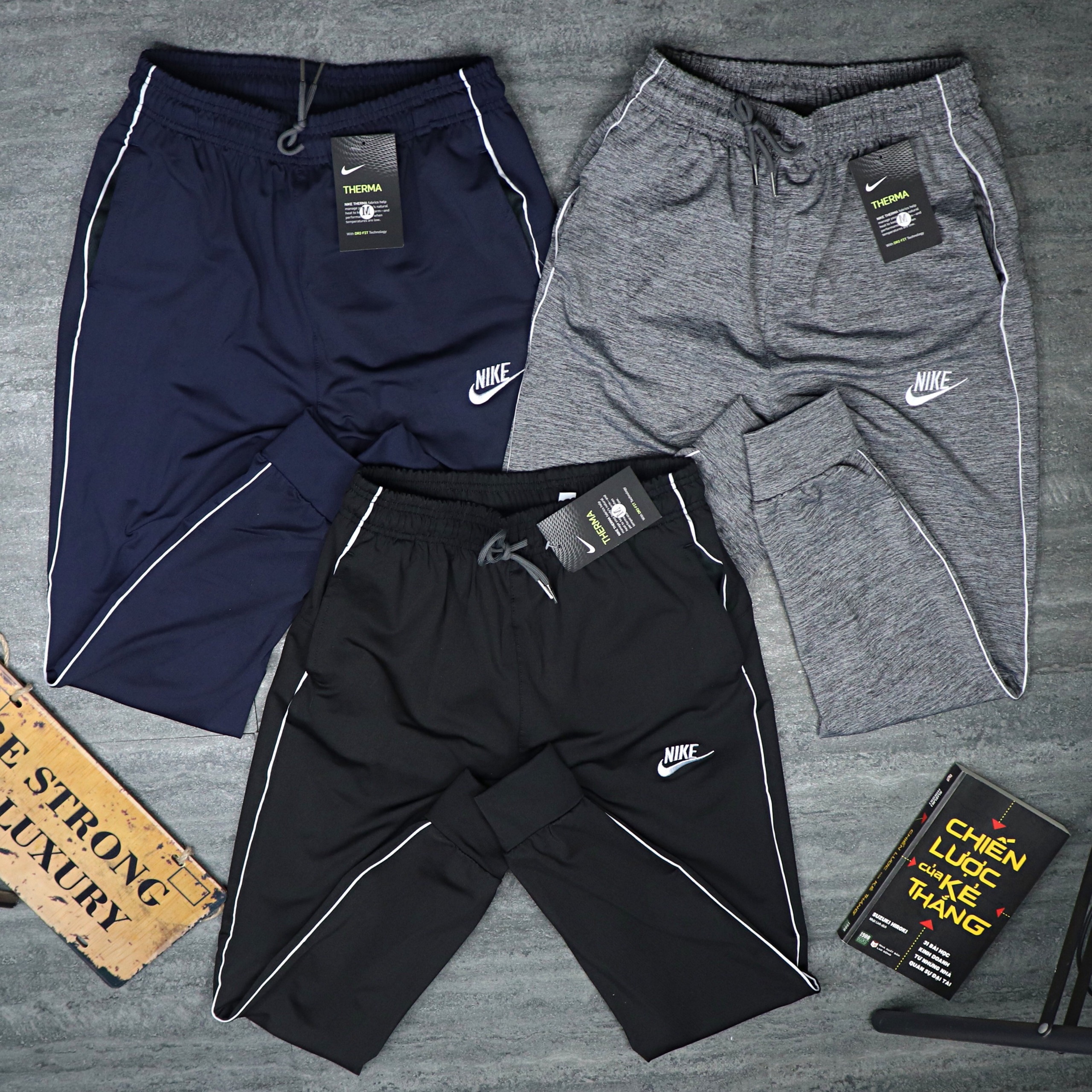 Quần dài thể thao nam thun co dãnQuần jogger nam sọc sườn trắng VNXK