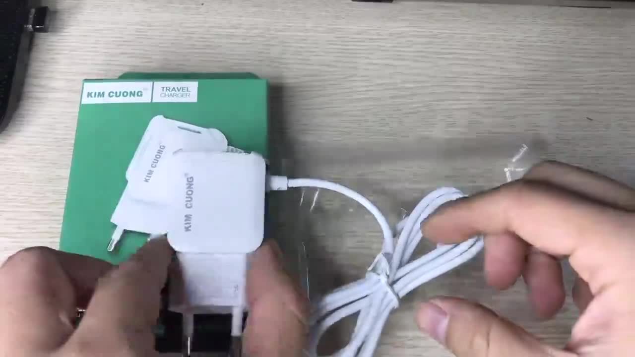 Bộ sạc điện thoại Kim Cương 1.5A liền dây tích hợp thêm đầu USB