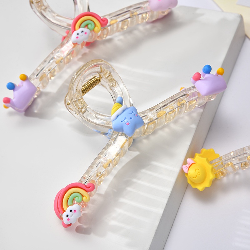 Kẹp càng cua chéo trong răng gắn charm -
