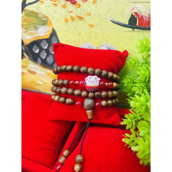 Chuỗi vòng tay trầm hương tốc thiên nhiên phối charm mèo thần tài