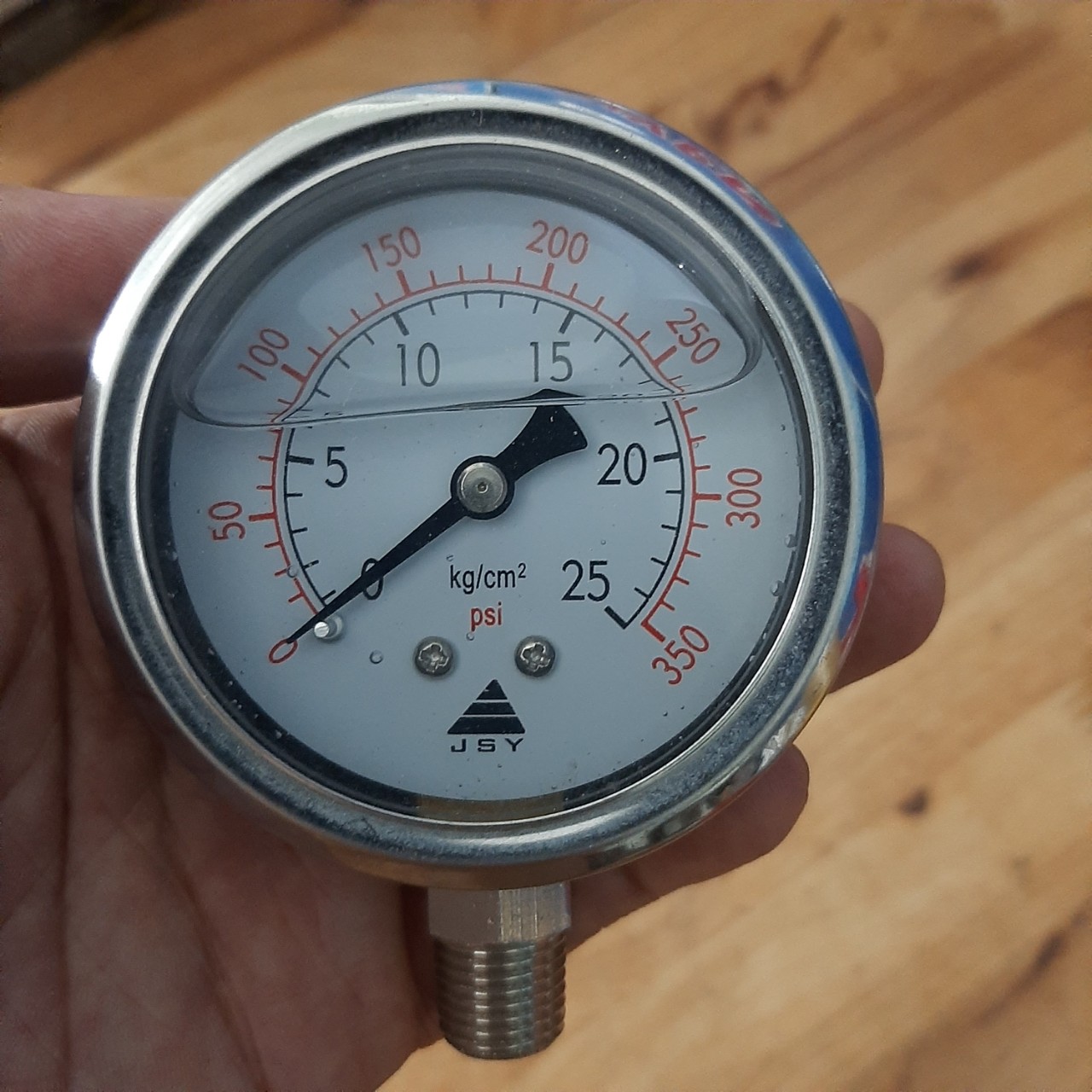 Đồng hồ đo áp suất khí nén Inox mặt có dầu áp 25kg/cm2