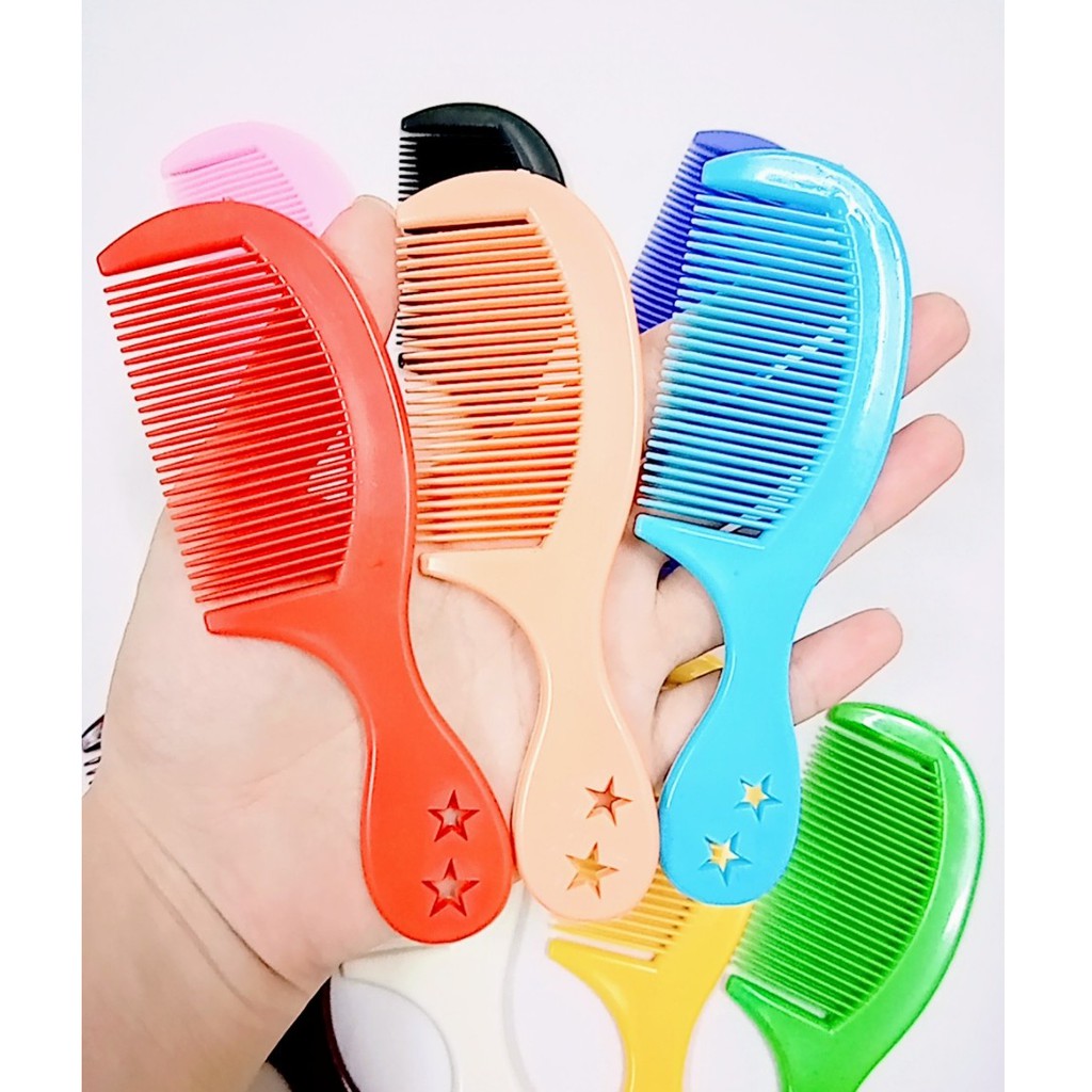1 cây lược nhựa mini màu trơn bỏ túi