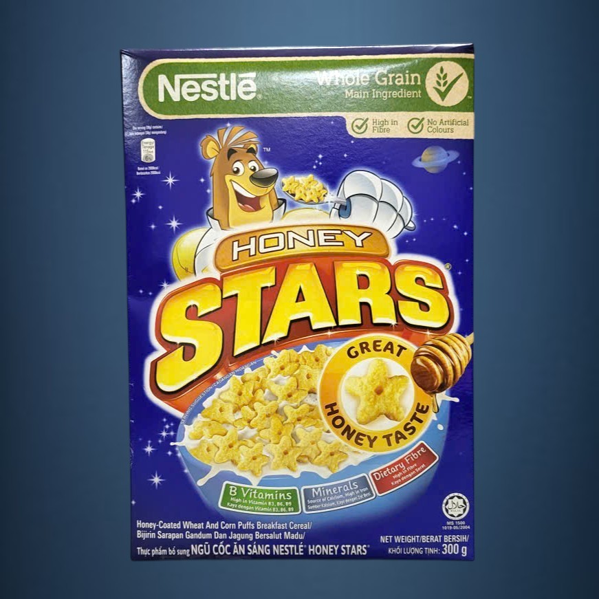 NESTLE - Hộp STARS 300g - NGŨ CỐC ĂN SÁNG MẬT ONG Whole Grain Honey Stars(HALAL)