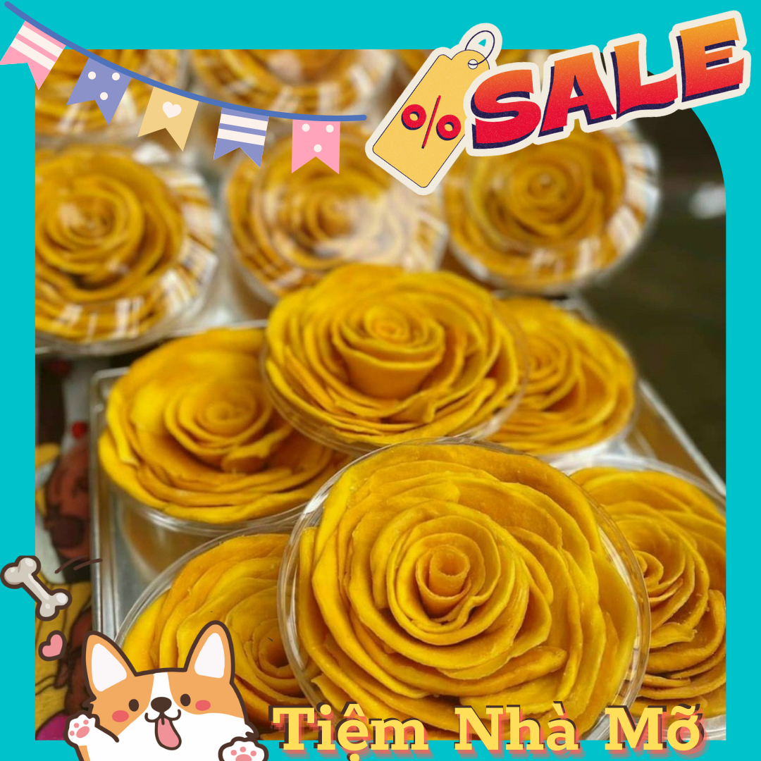 HỘP 500gr XOÀI SẤY DẺO XẾP HOA HỒNG Xoài sấy dẻo tự nhiên với công nghệ sấy lạnh giữ được hương vị và màu sắc tự nhiên của trái xoài mà miếng xoài ko hề bị khô cứng