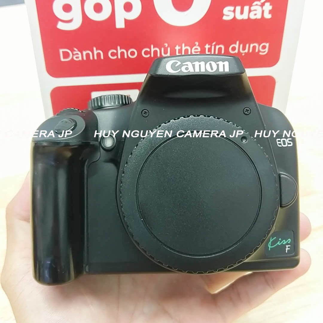 Máy ảnh canon 1000d , ống kính canon 18 55 .