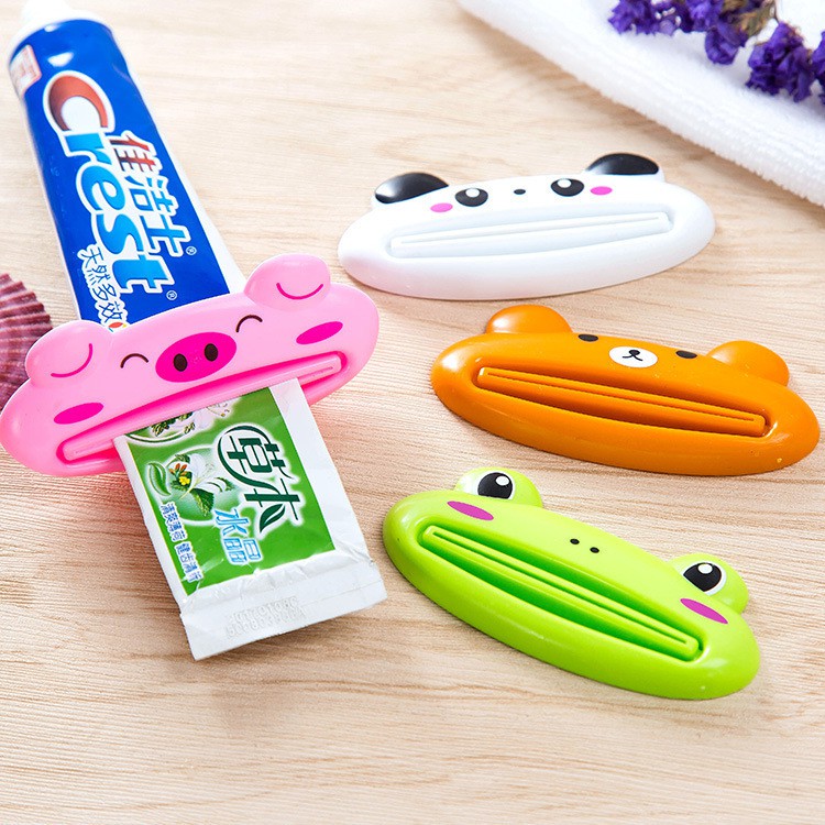 Combo 2 dụng cụ kẹp kem đánh răng hình thú, nặm kem đánh răng