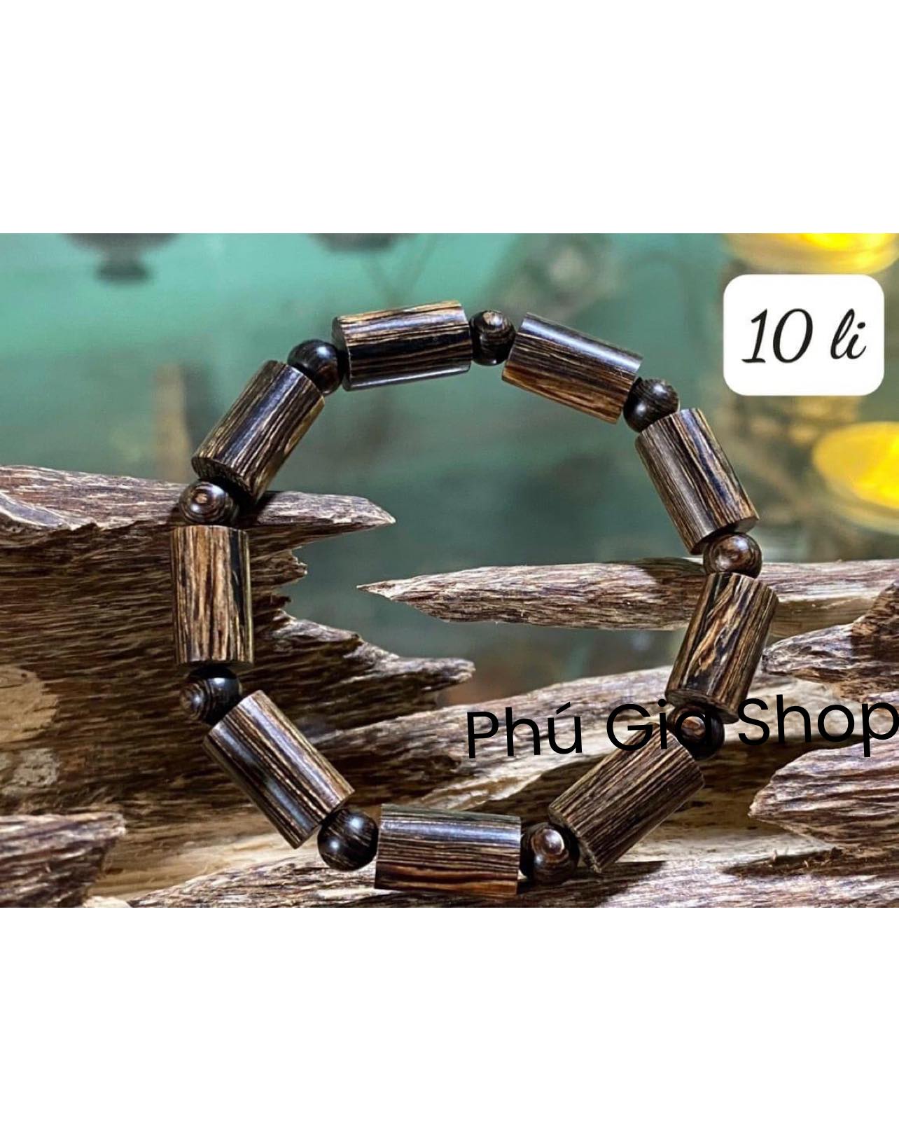 Vòng Tay gỗ Trầm hương sánh chìm đốt trúc 10 ly.bảo hành mùi thơm vĩnh viễn
