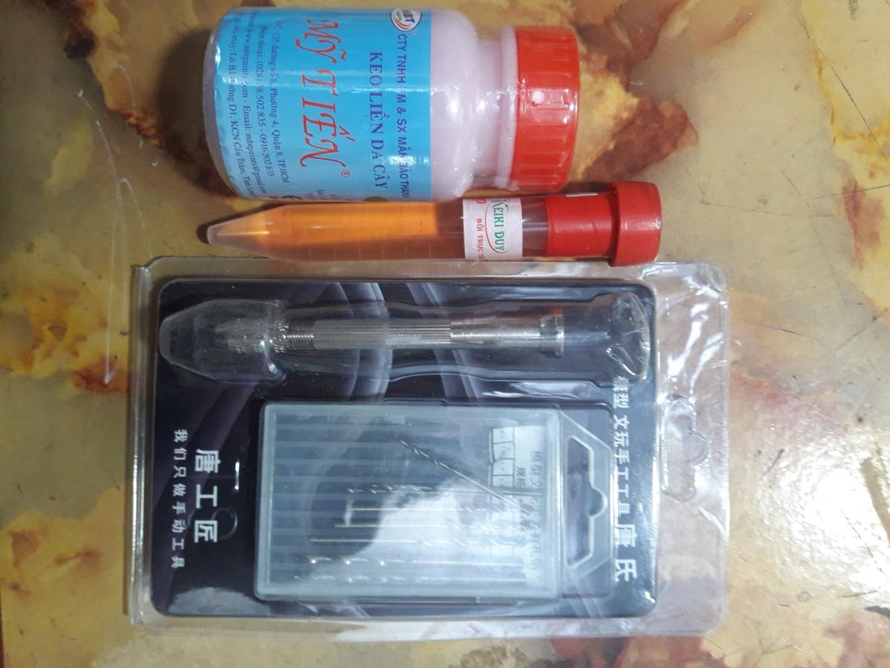 Com bo kích kie cho hoa lan ( gồm 1 bộ khoan , 1 keo liền sẹo Mỹ tiến , 1 kích kie duy đỏ)