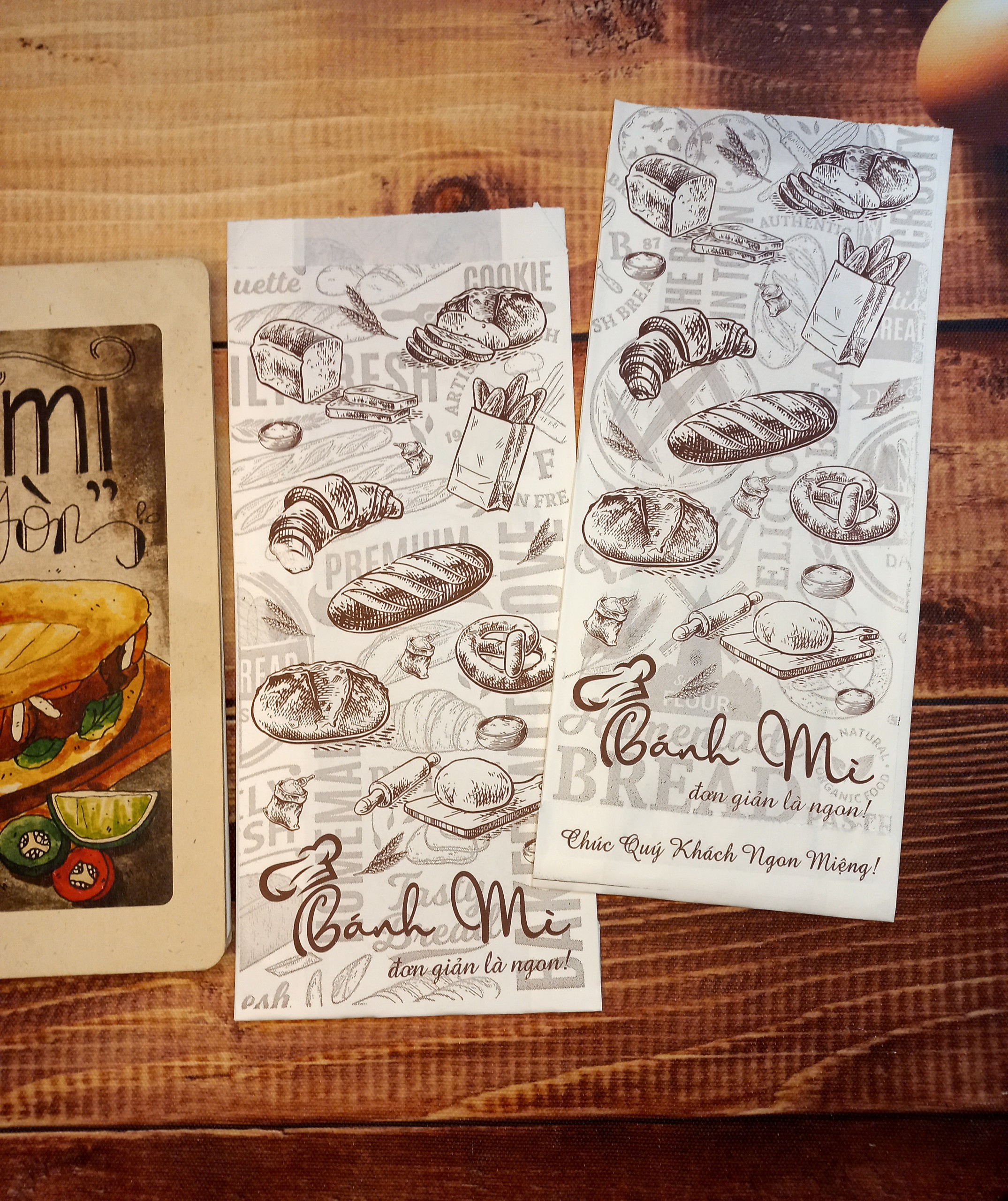 100 Túi Giấy Đựng Bánh Mì Truyền Thống chủ đề "Đơn Giản Là Ngon (07)". NHẬN IN THƯƠNG HIỆU RIÊNG CHỈ TỪ 500 TÚI.