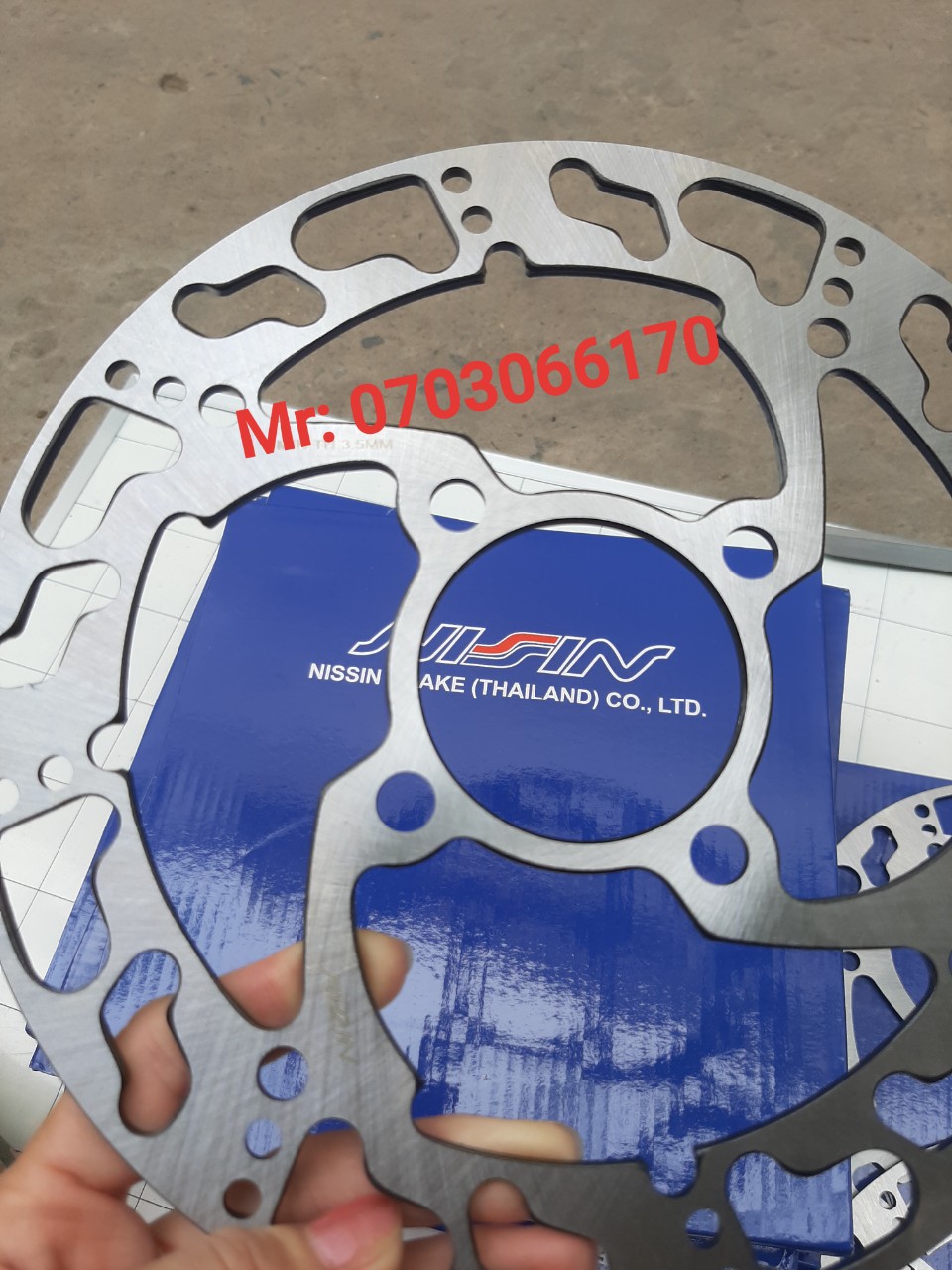 Một cái đĩa trước ninsin thái lan gắn xe wave và các dòng xe có đĩa trước