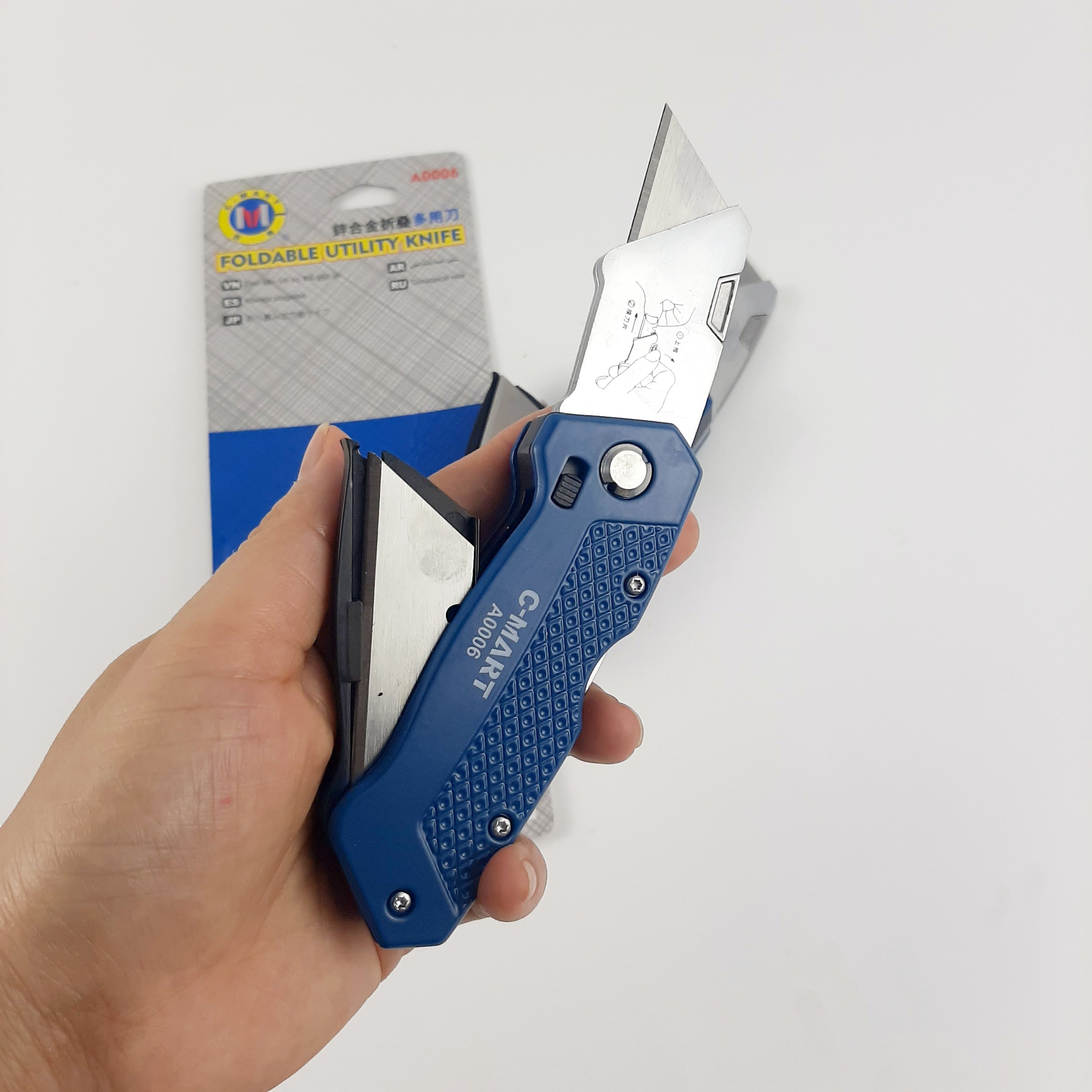 Dao rọc giấy cán xếp gấp gọn A0006 CMART kèm 6 lưỡi dao rọc cáp siêu sắc