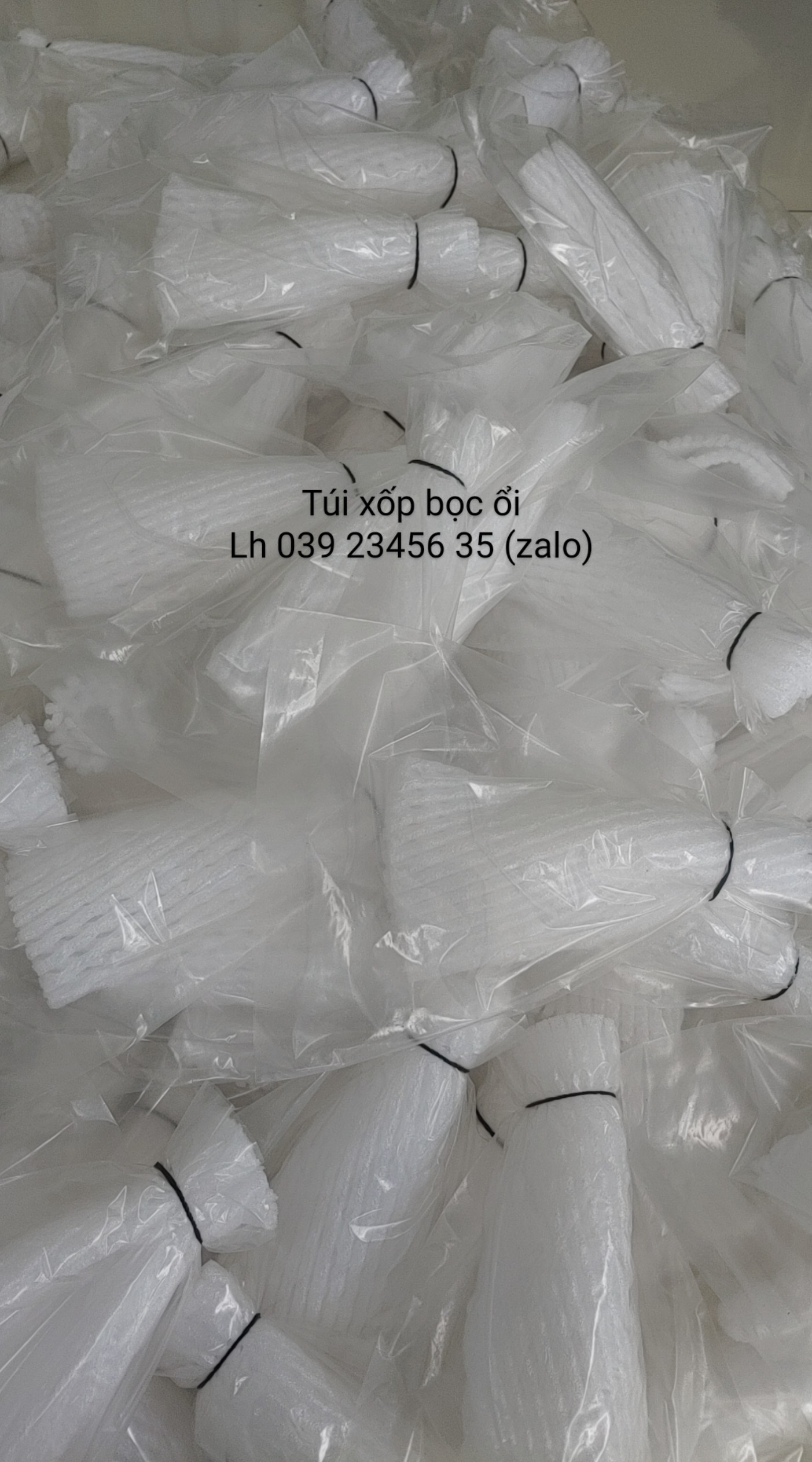 500 cái túi xốp bọc ổi ,na , vú sữa hoàng kim đã được lồng sẵn