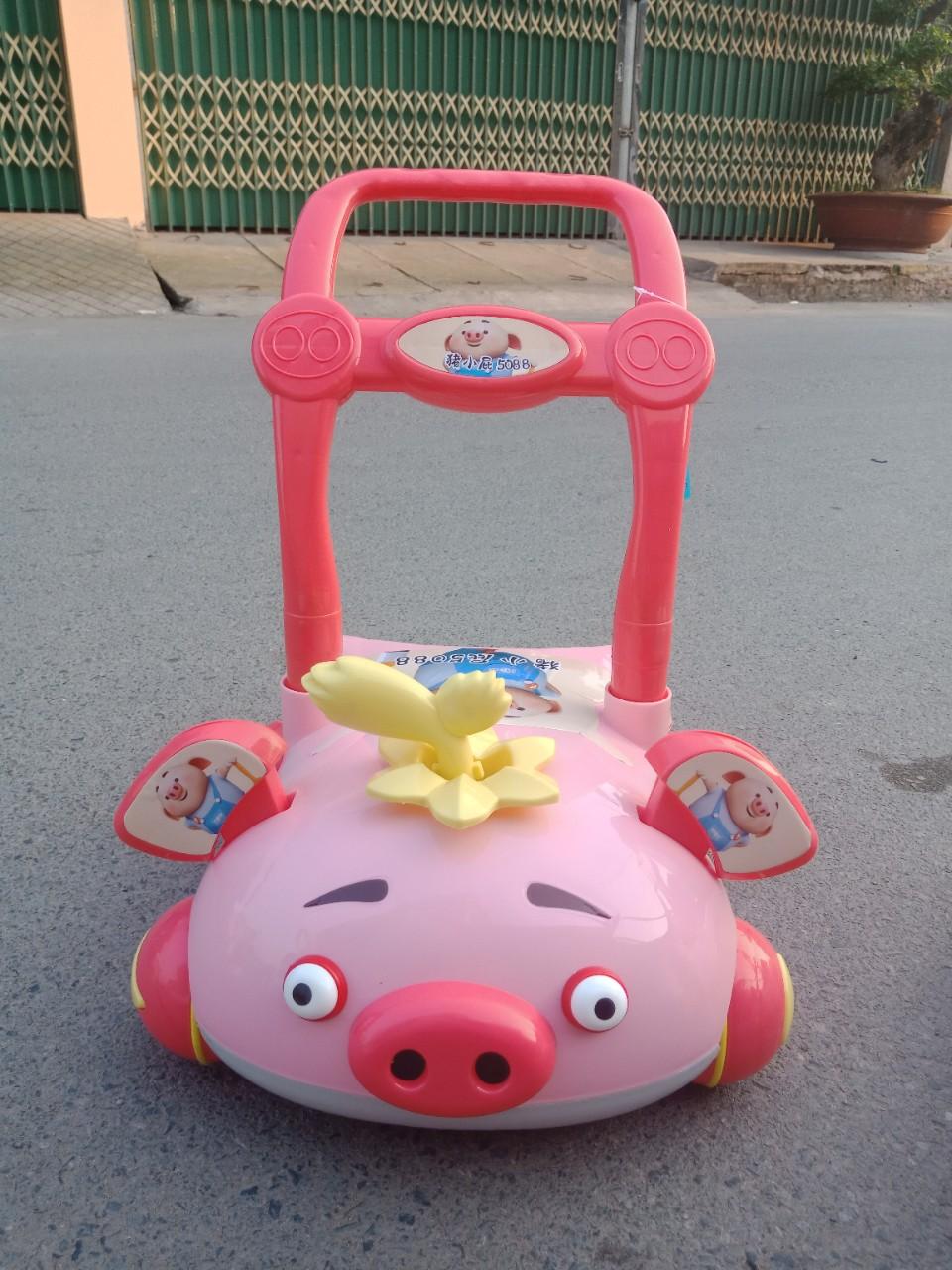 XE TẬP ĐI CHO BÉ HÌNH CON HEO MÀU HỒNG CÓ NHẠC