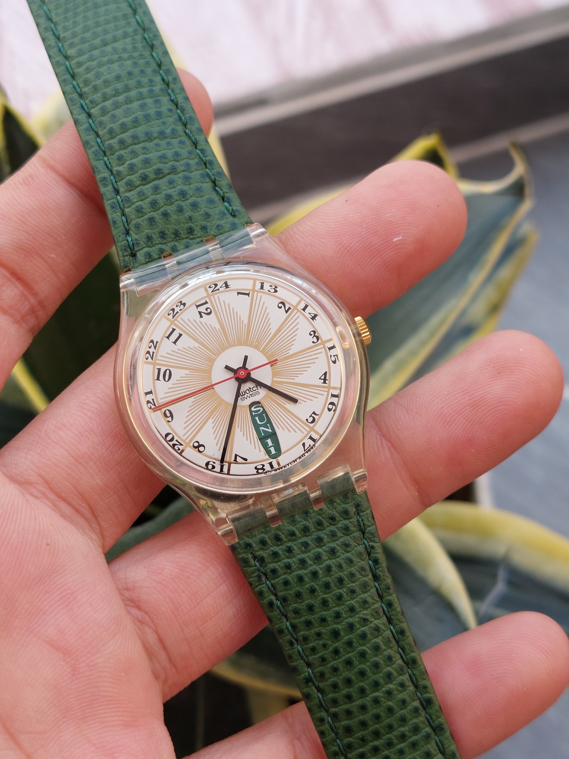 Đồng hồ Thuỵ Sĩ nữ Swatch dây xanh chạy pin hàng Si