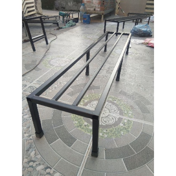 Kệ thép. dài 100cm. rộng 30cm. cao 30cm. 6 chân. 2 nan phụ. hộp thép 2x2cm