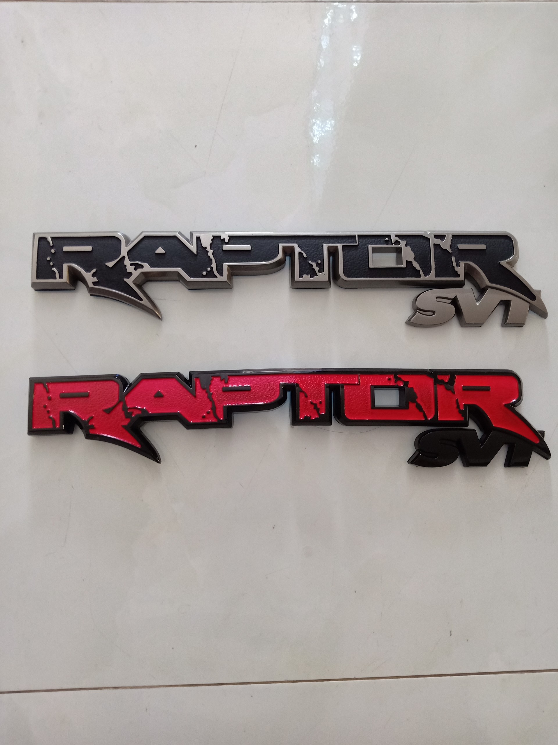 Tem nhựa abs dán đuôi xe raptor raptor sv1 màu đen