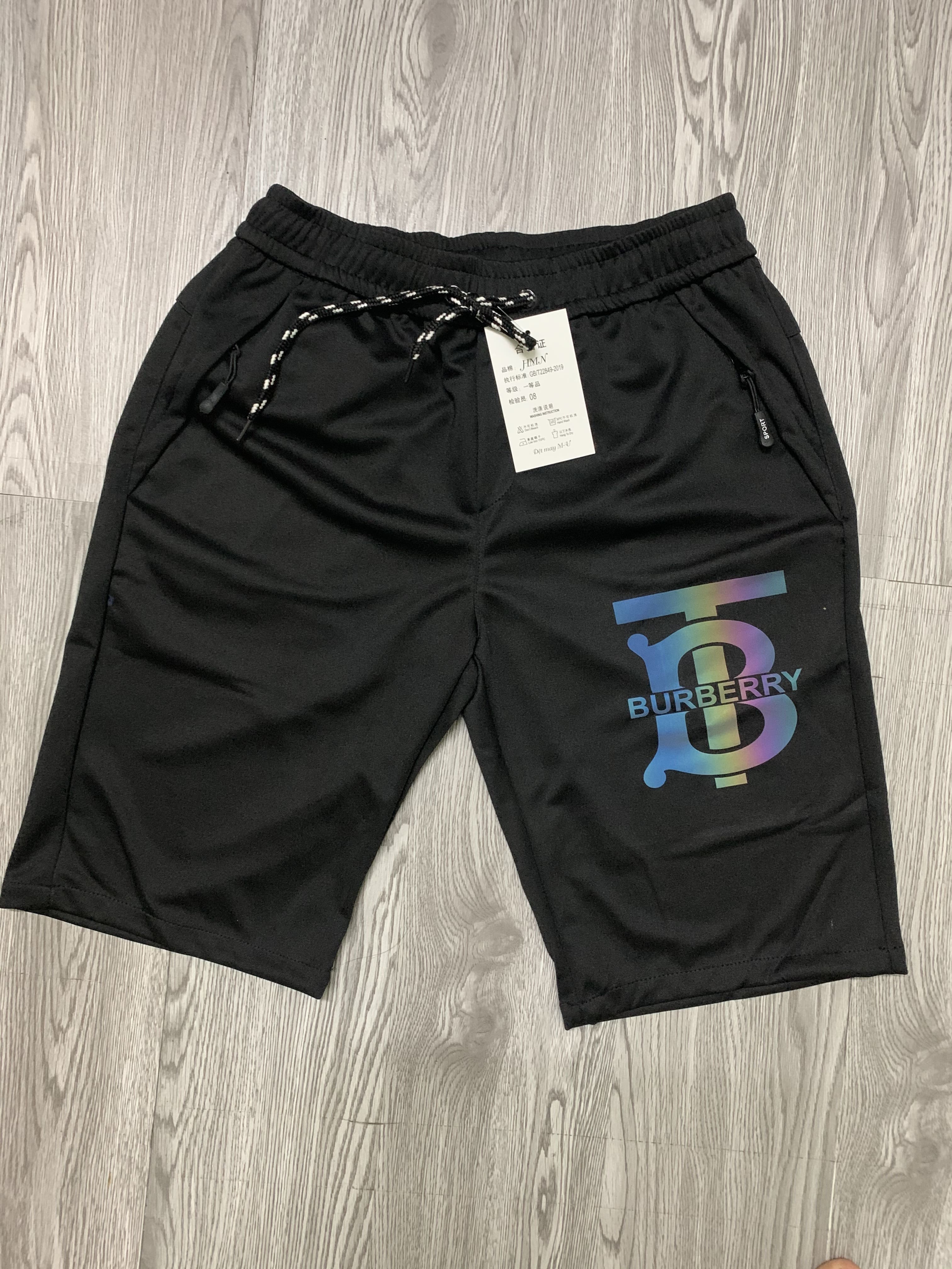 QUẦN NGỐ NAM ,QUẦN SHORT NAM ,THUN LẠNH UMI HÀN QUỐC CO GIÃN LOGO PHẢN QUANG (ảnh chụp thật 100%)