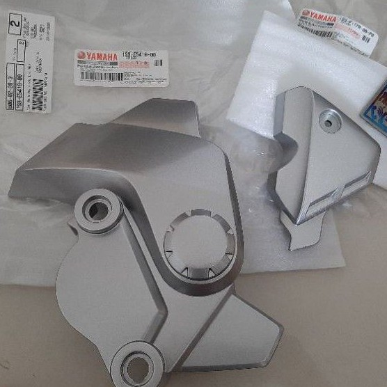 Cặp ốp nhựa che nhông mang cá giò đạp xe Exciter 2005-2010