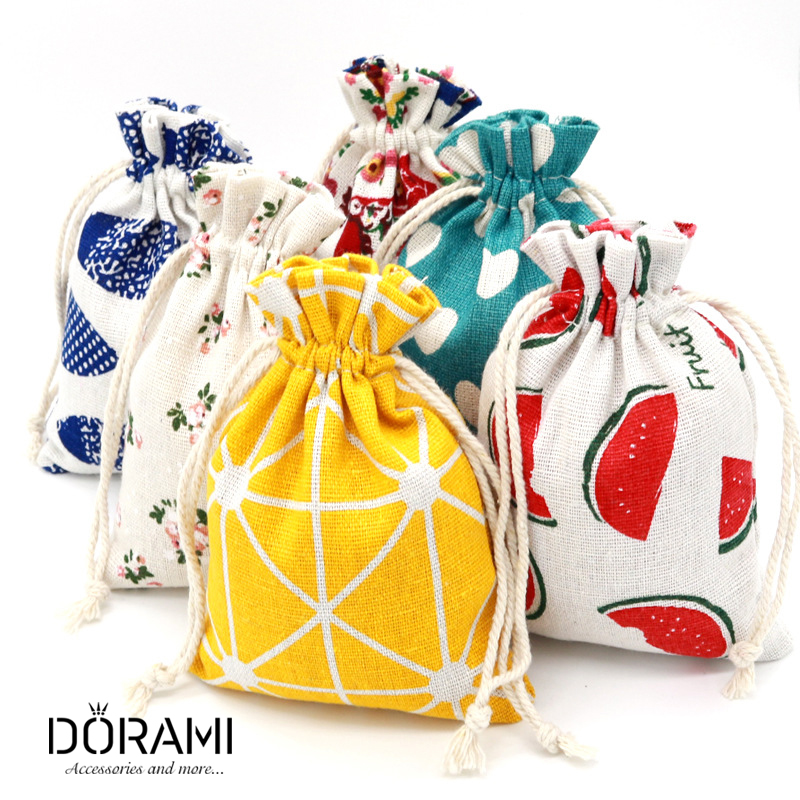 Combo 10 túi vải có dây rút nhiều họa tiết kích thước 10x14cm - dorami
