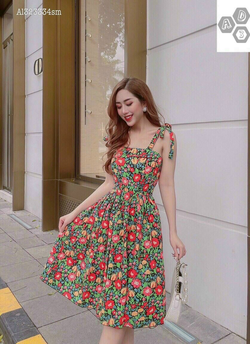 Đầm xoè 2 dây cột nơ vai hoạ tiết hoa xinh lung linh có mút ngực