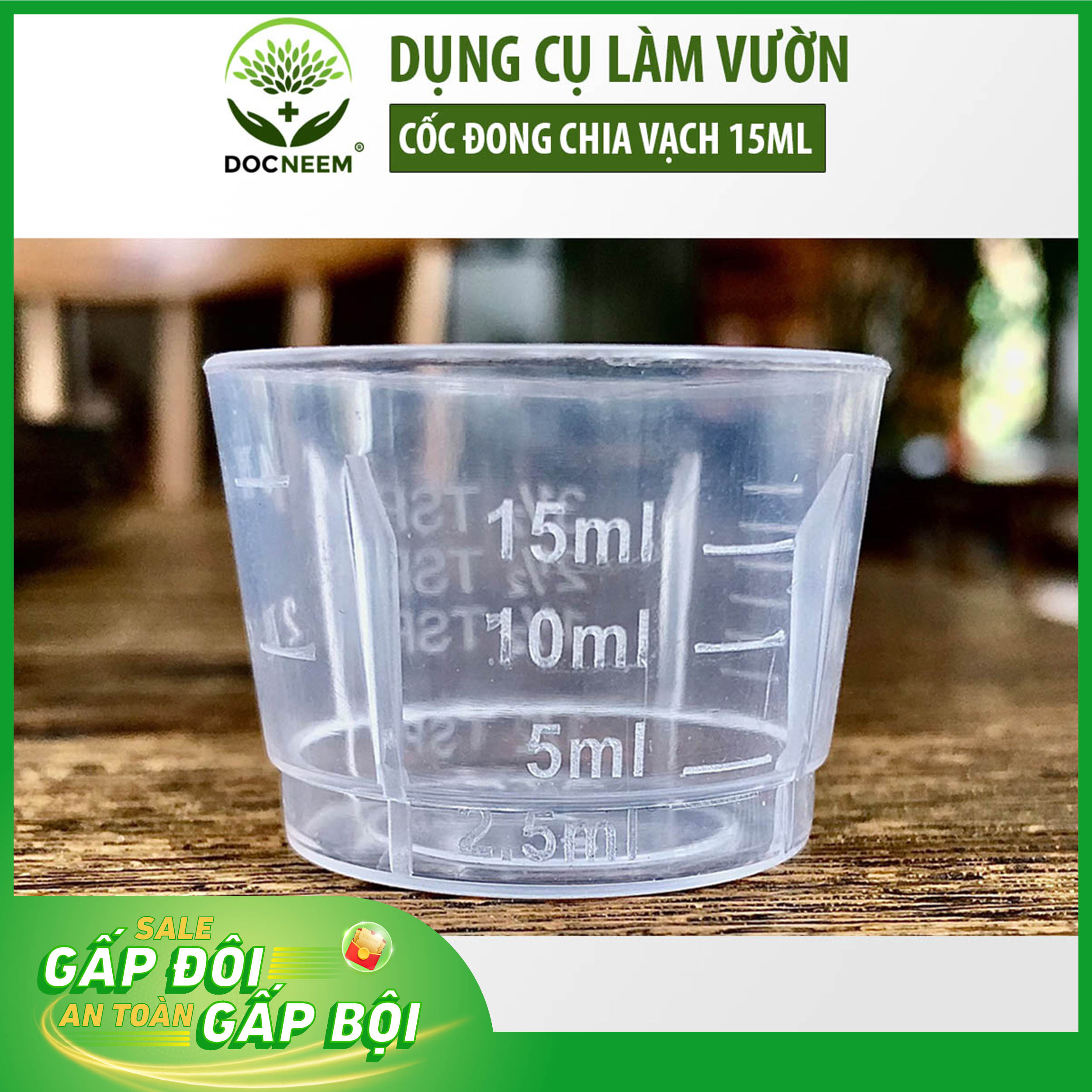 Dụng cụ cốc đong dầu neem và phân bón Docneem trong làm vườn, có chia vạch chính xác, hỗ trợ bón phân, phun trị bệnh, chăm cây cảnh