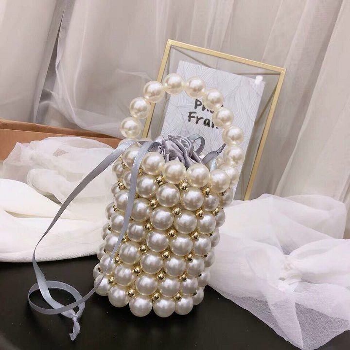 Túi xách tay đeo chéo nữ ngọc trai hình tròn cực chất