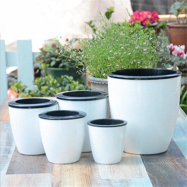 [HCM]Chậu trồng cây thông minh tự tưới nước - đường kính 13cm