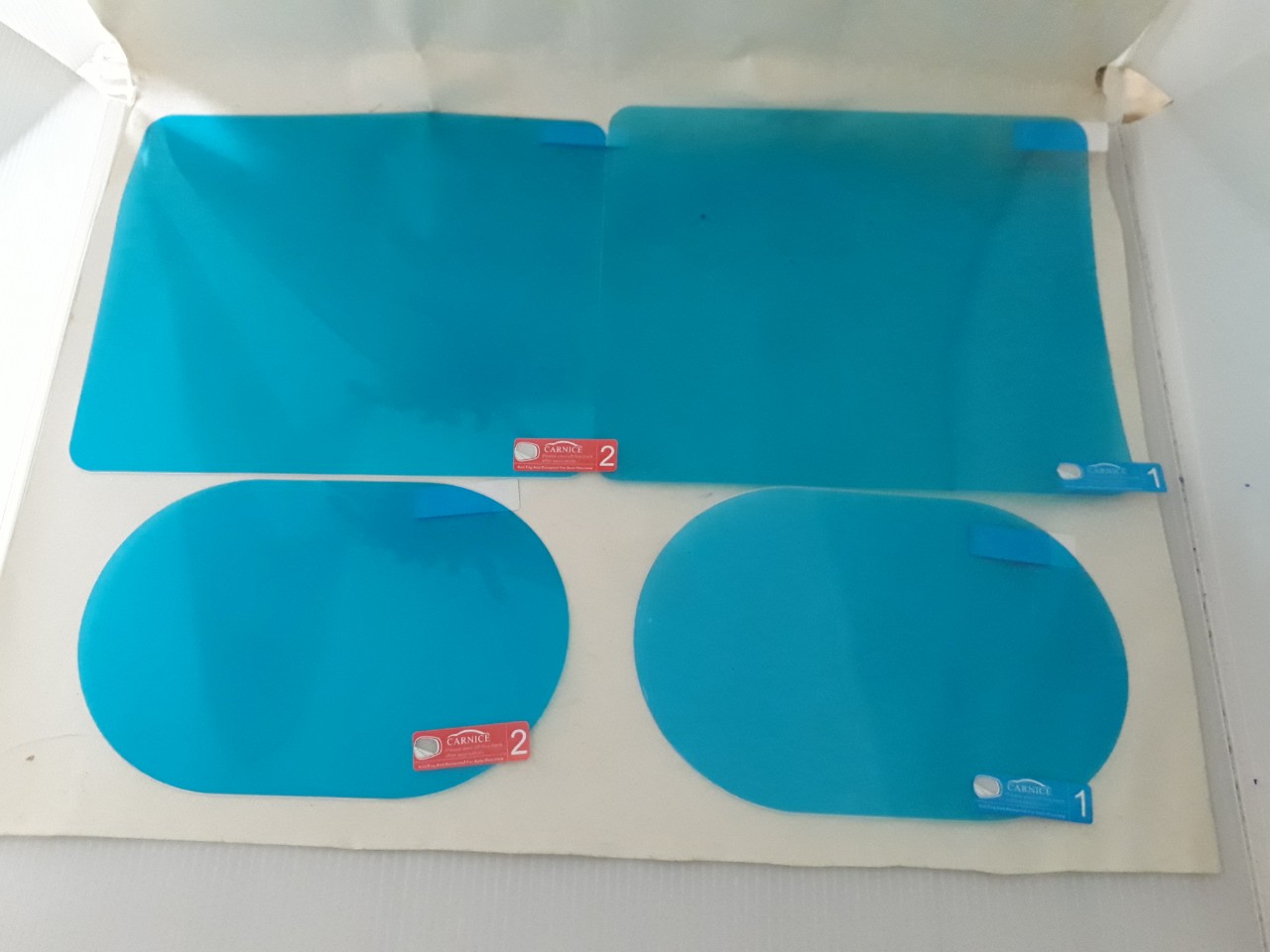 Bộ 04 Miếng Dán Chống Đọng Nước Kính Hông và Gương Chiếu Hậu ô tô, xe hơi cao cấp