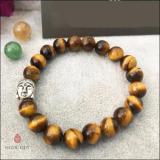 Vòng tay mắt hổ vàng nâu mix charm phật bạc