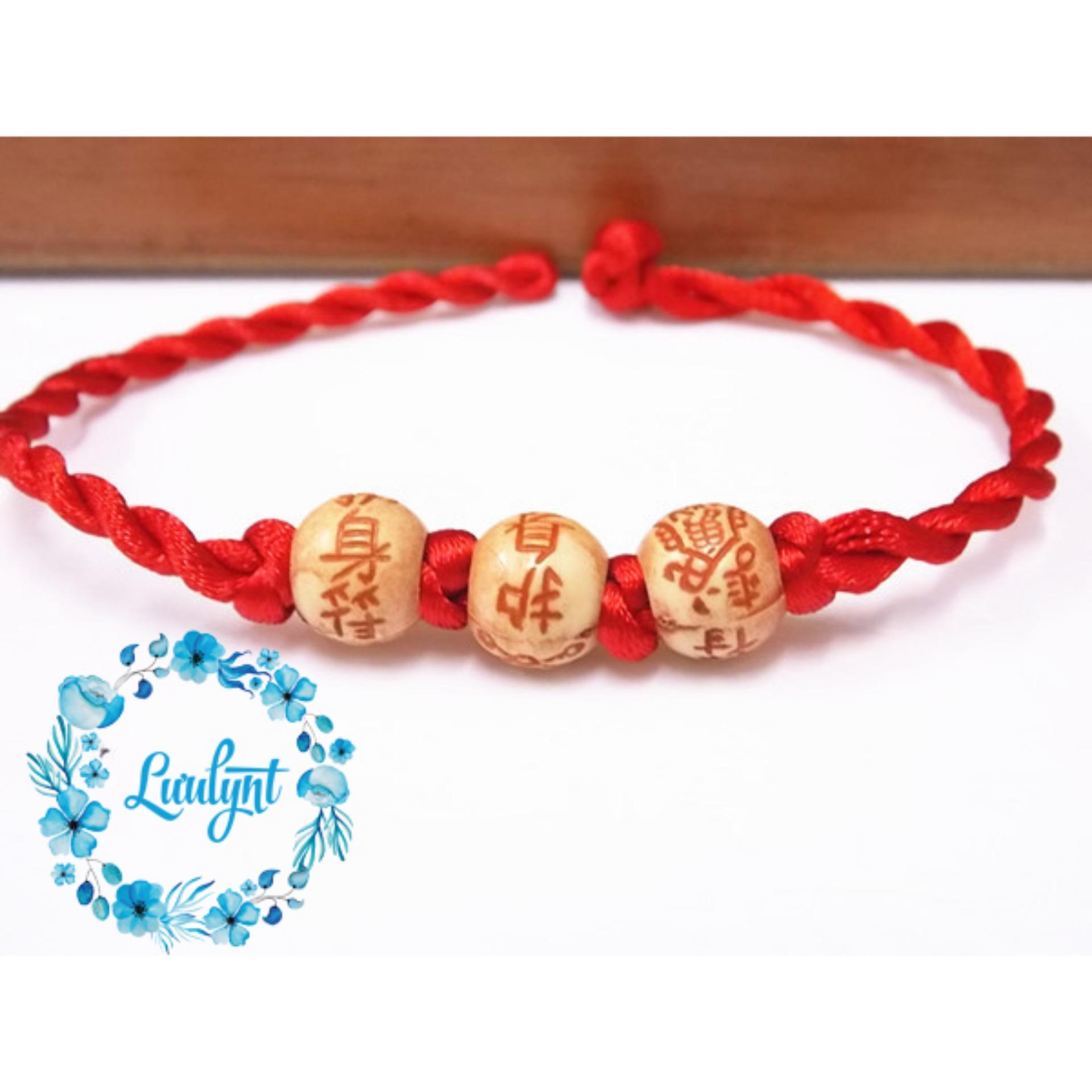 Vòng tay sợi chỉ đỏ
