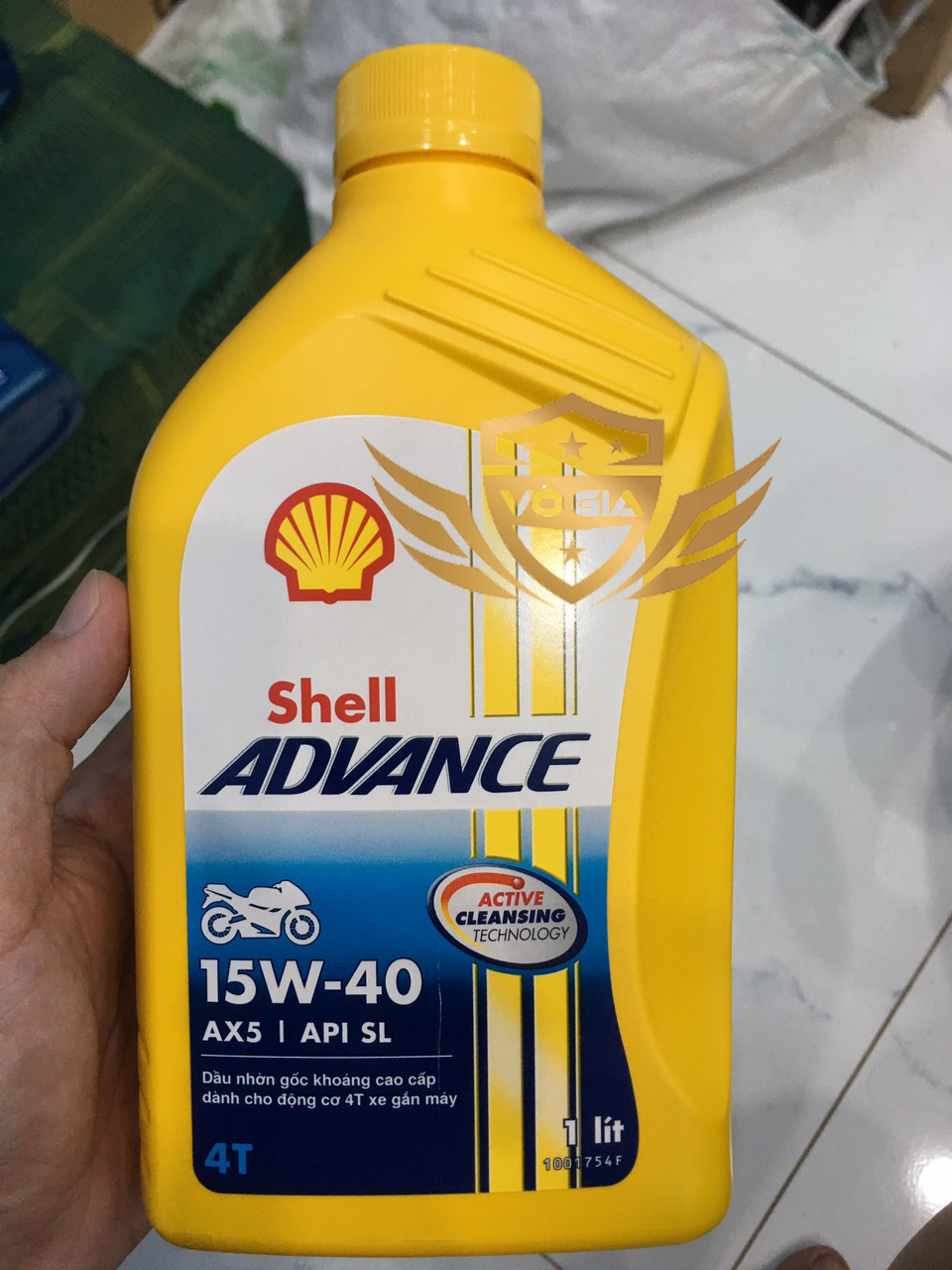 Nhớt shell ax5 15w40 vàng 800ml dùng cho xe số