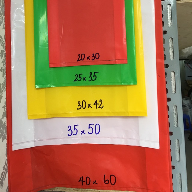 1kg túi shop đục lỗ hạt xoài các màu đựng mỹ phẩm, thời trang. túi nilon bọc gói hàng