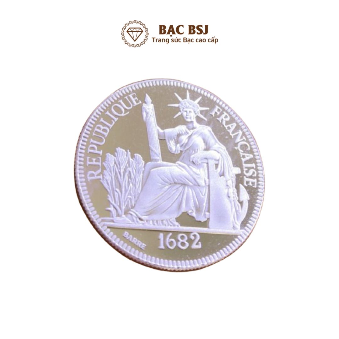 Đồng bạc đánh gió nguyên chất, đồng bạc hoa xòe đường kính 3.8 cm dày 2 mm trọng lượng 7.3 - 7.5 chỉ. Bạc BSJ