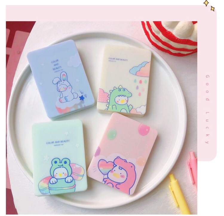 Gương cầm tay có lược
