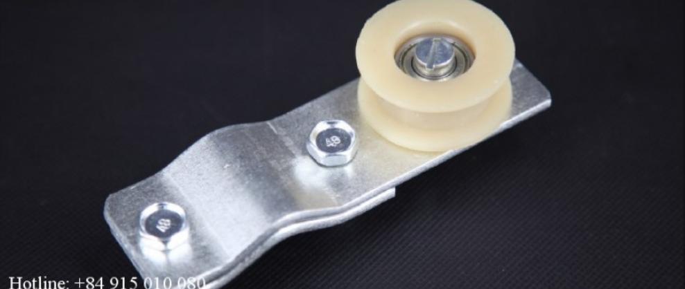 Bánh tì căng xích cho xe đạp gắn động cơ 2 thì