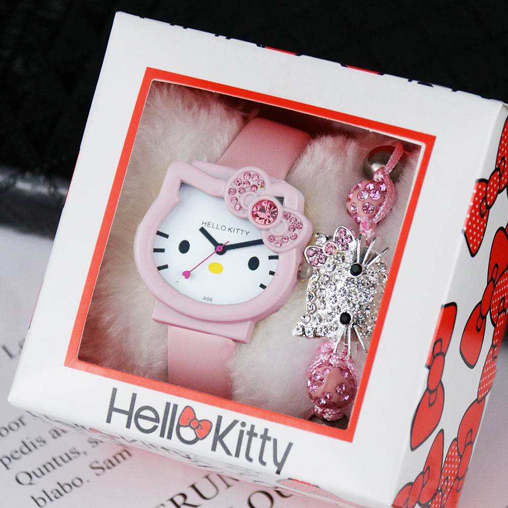 Đồng hồ đeo tay cho bé gái kèm lắc tay xinh xắn PINK038 Pink Xinh Decor Hello Kitty màu hồng đỏ da dây kim loại