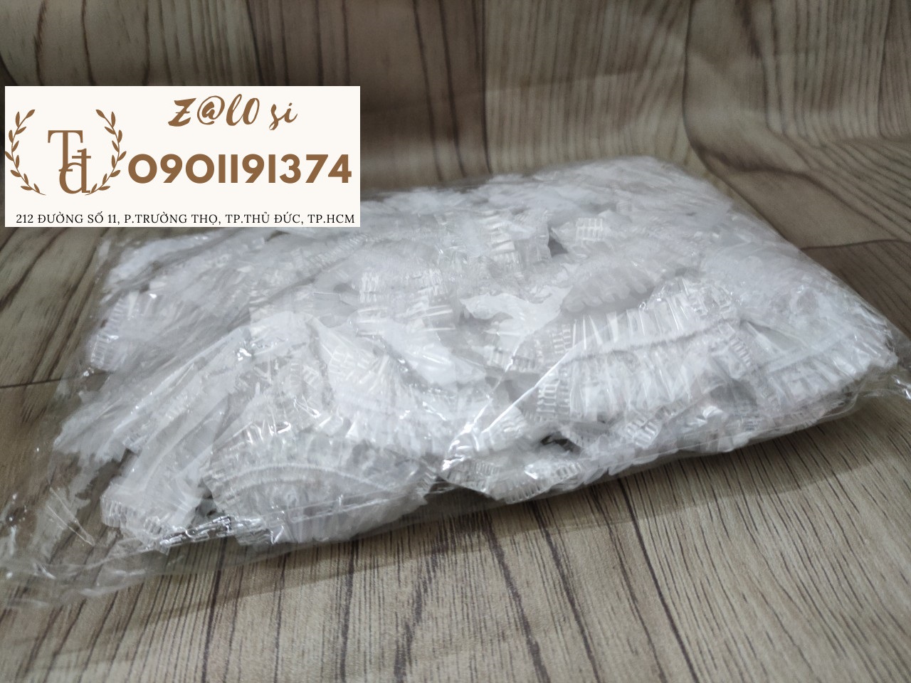 Bịch 100 cái chụp tai ni lông màu trắng
