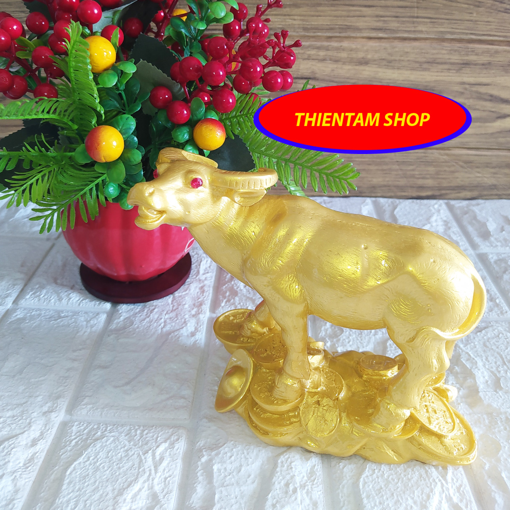 Tượng Trâu phong thủy đá poly vàng sang trọng THANV17