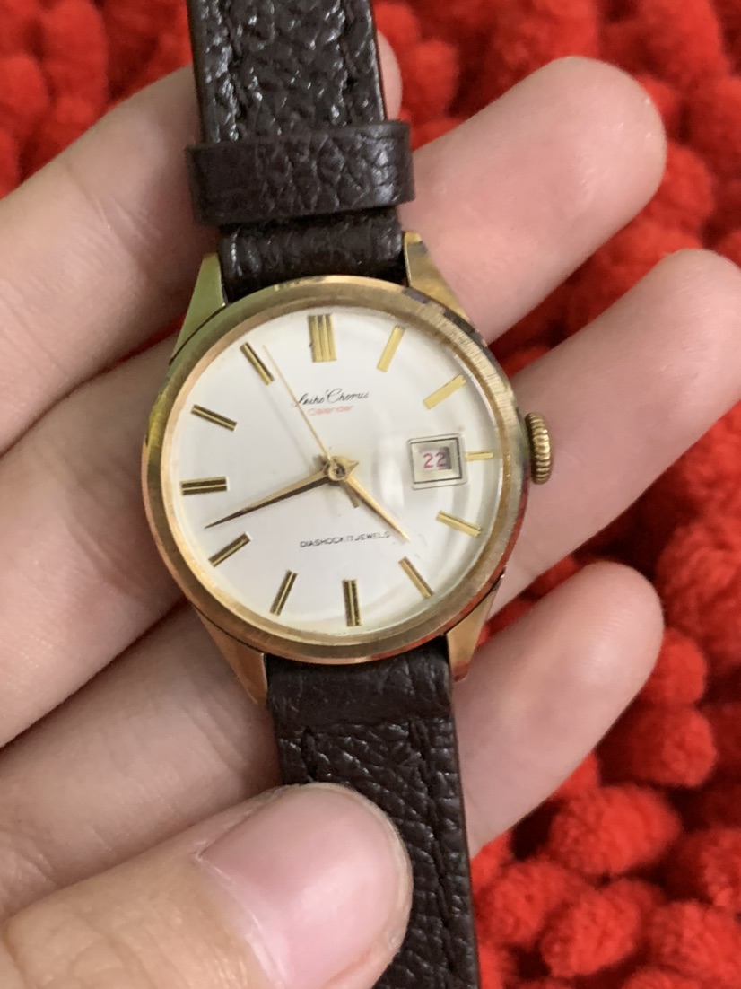 Đồng hồ nữ Seiko 1 lịch cơ cót lắc kê vàng hàng si