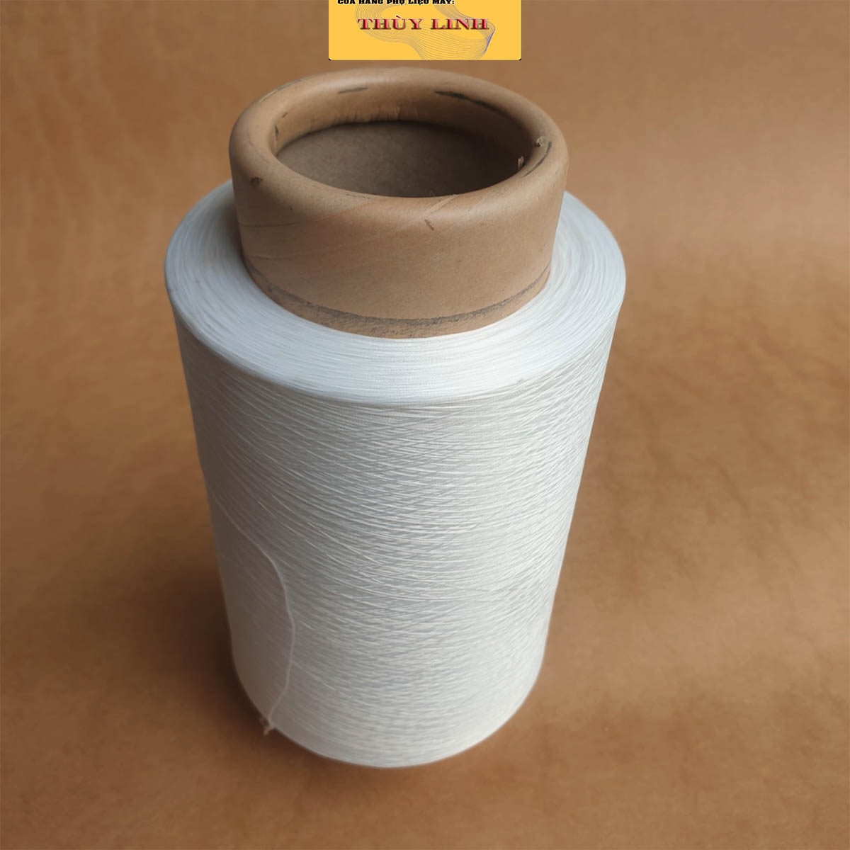 Tơ trắng vắt sổ 150 , 600 gram/ cuộn