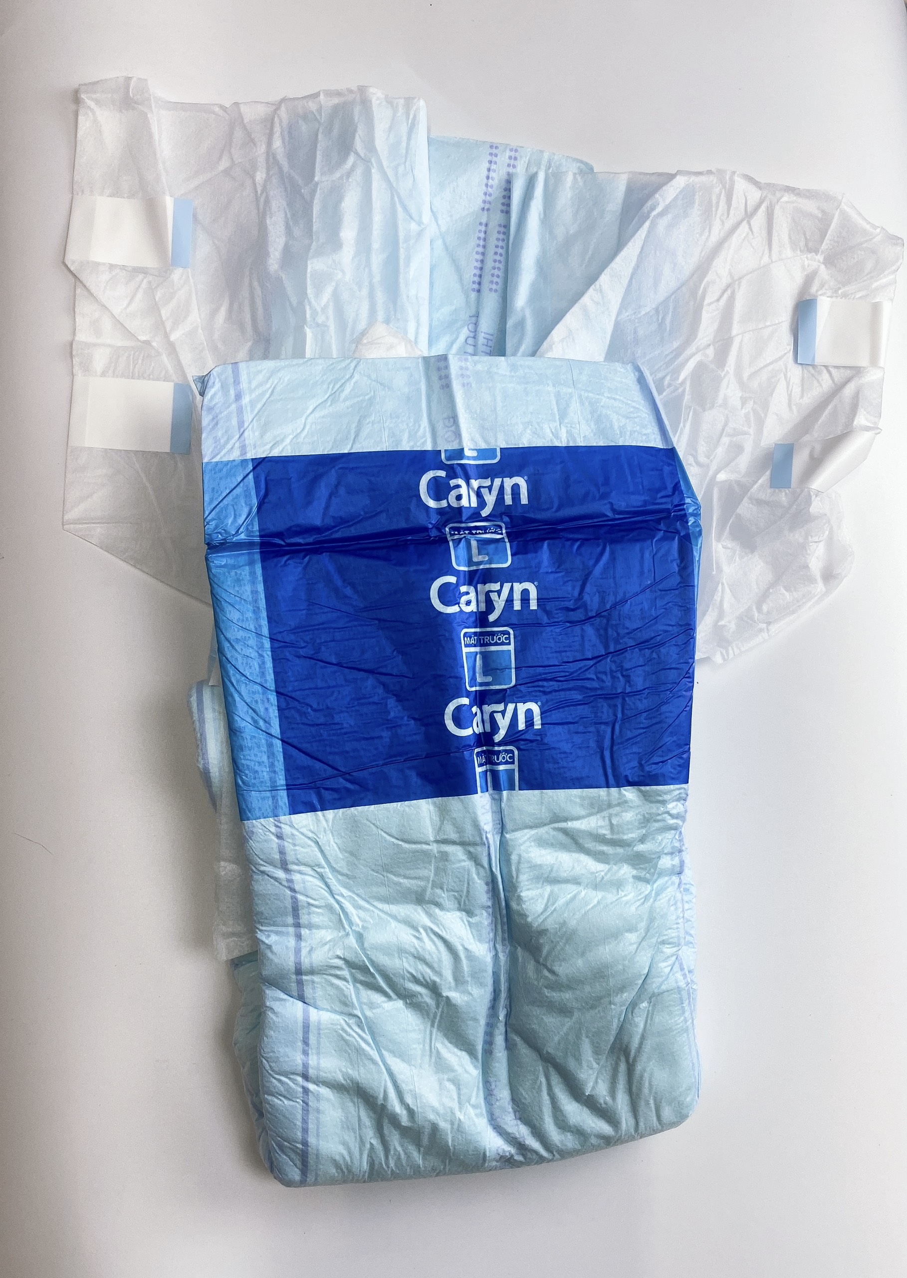 Tách lẻ Tã dán người lớn Caryn bỉm dán gói L20 XL20 Lõi bông cao cấp thấm hút mỏng nhẹ,cho bề mặt luôn khô thoáng