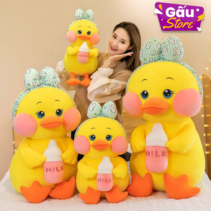 Gấu bông vịt má hồng ôm bình sữa cute phô mai que - thú nhồi bông