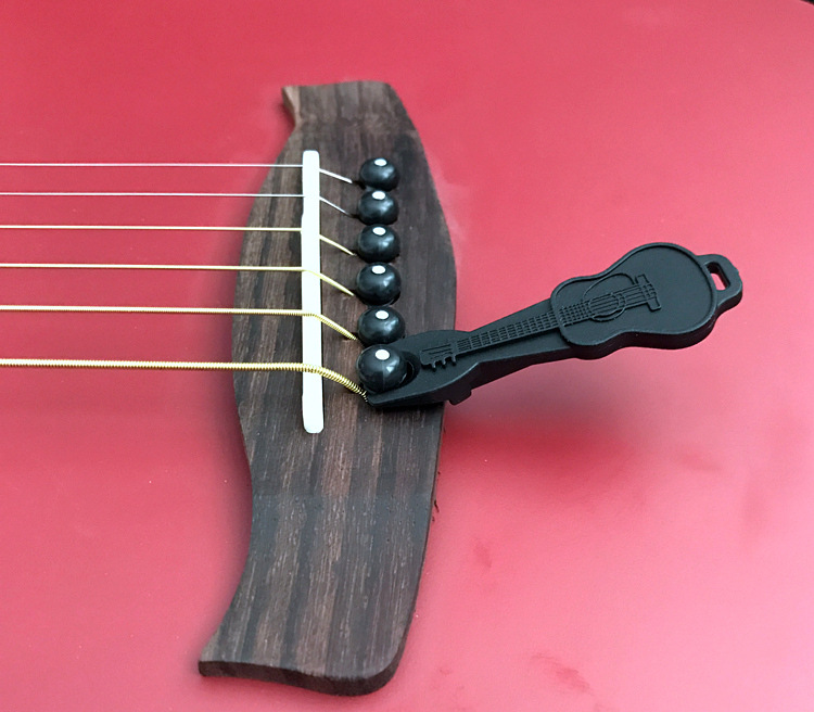 Dụng cụ gẩy chốt đàn guitar - ukulele