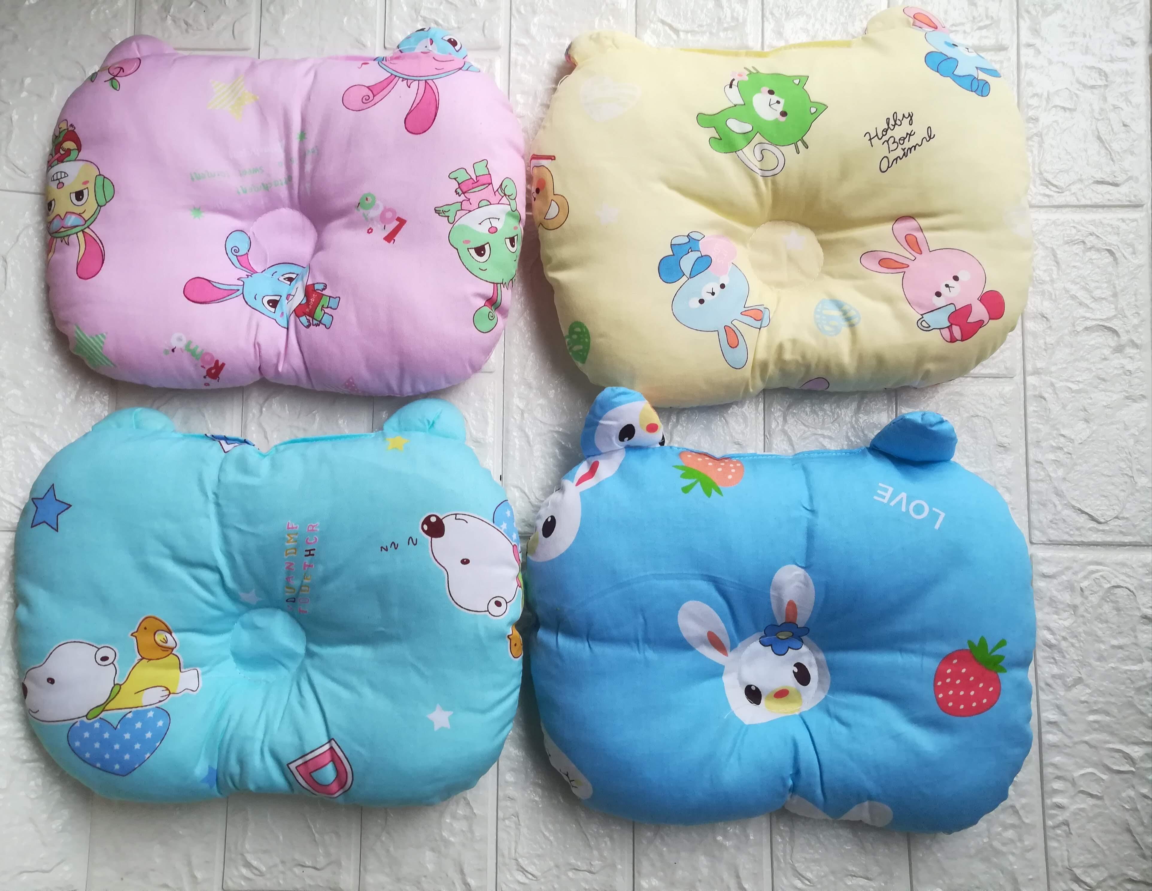 Gối bông lõm sơ sinh họa tiết